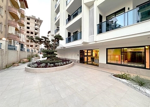 Современная квартира 1+1 в новом комплексе с видом на море в центре Аланьи