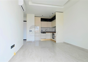 Современная квартира 1+1 в новом комплексе с видом на море в центре Аланьи