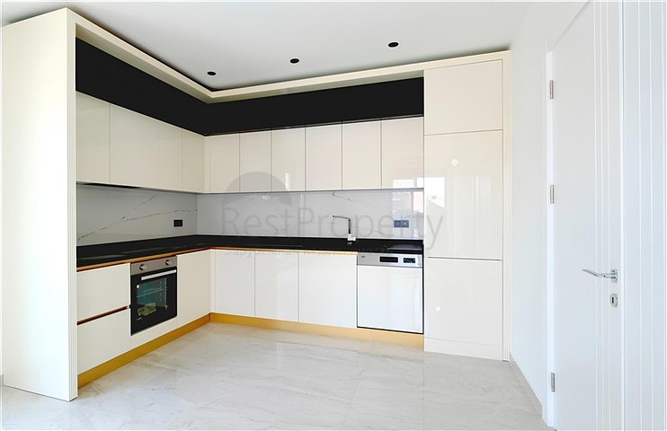 Просторная квартира 2+1 в новом комплексе с видом на море в центре Аланьи