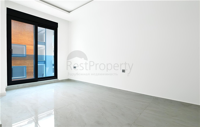 Просторная квартира 2+1 в новом комплексе с видом на море в центре Аланьи