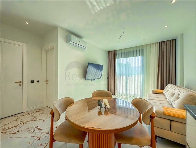 Современная квартира 1+1  в районе Оба