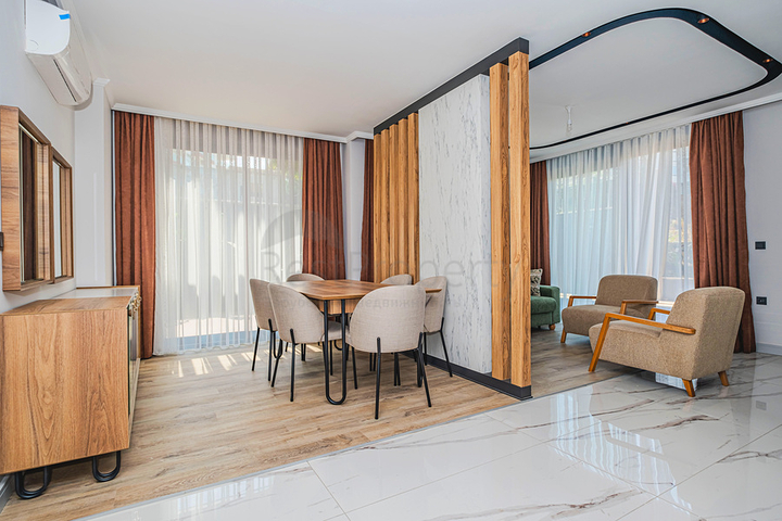 Современная квартира с садом у моря в живописном районе