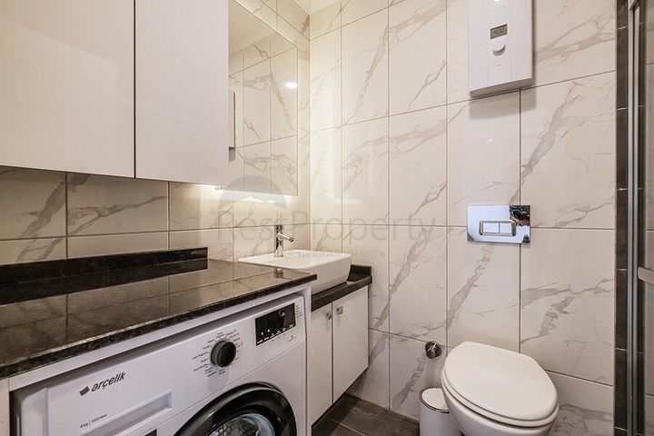 Современная квартира в районе Махмутлар рядом с морем