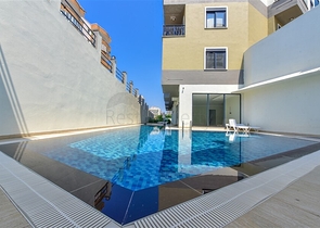 Современная квартира в районе Махмутлар рядом с морем