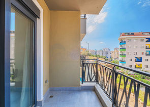 Современная квартира в районе Махмутлар рядом с морем