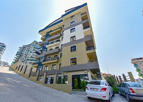 Современная квартира в районе Махмутлар рядом с морем