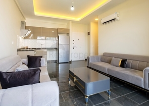 Современная меблированная квартира в комплексе с богатой инфраструктурой в Махмутларе