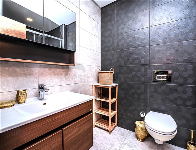 Современная квартира 1+1 в комплексе с богатой инфраструктурой в Махмутларе