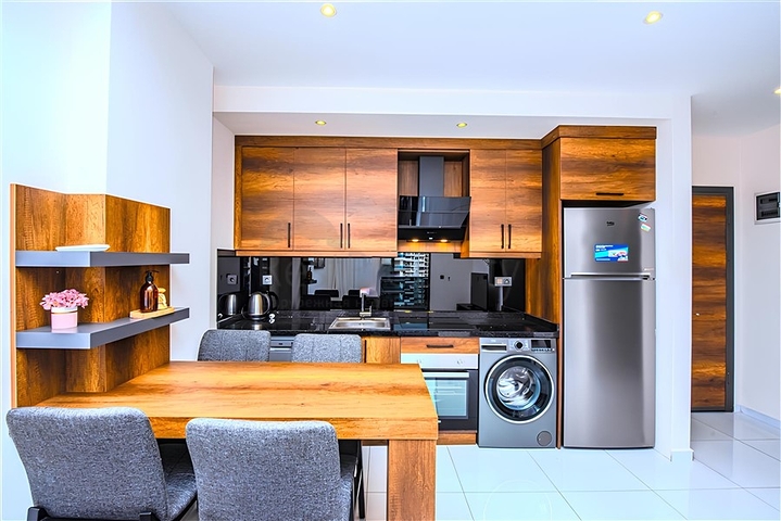 Современная квартира 1+1 в комплексе с богатой инфраструктурой в Махмутларе