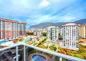 Современная квартира 1+1 в комплексе с богатой инфраструктурой в Махмутларе