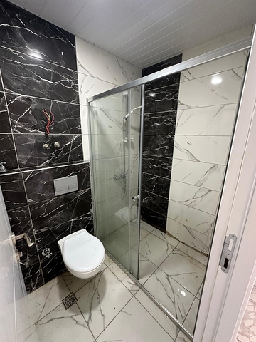 Современная квартира 1+1 с видом на море в Демирташе