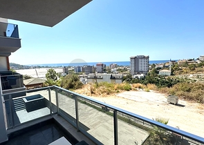 Современная квартира 1+1 с видом на море в Демирташе