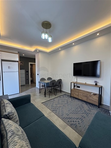 Современная квартира 1+1 в новом комплексе в Махмутларе всего 350 м от моря