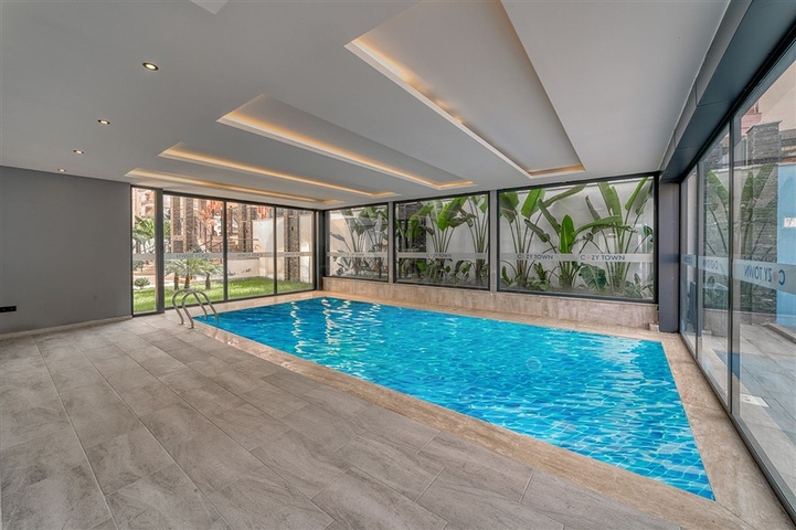 Современная квартира 1+1 в новом комплексе в Махмутларе всего 350 м от моря