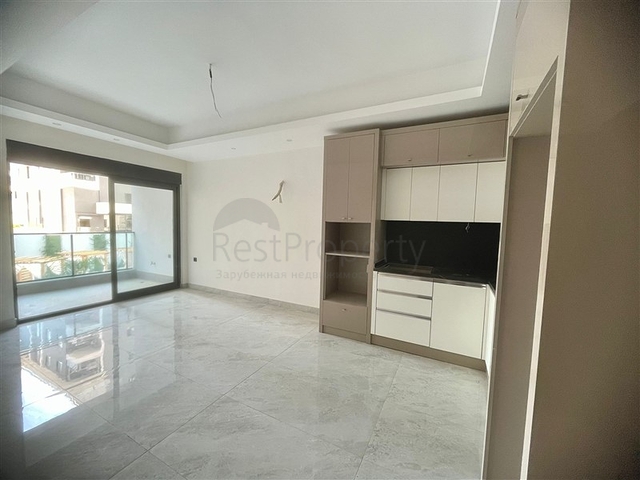 Современная квартира 1+1 в новом комплексе с бассейном и спа-зоной в Махмутларе