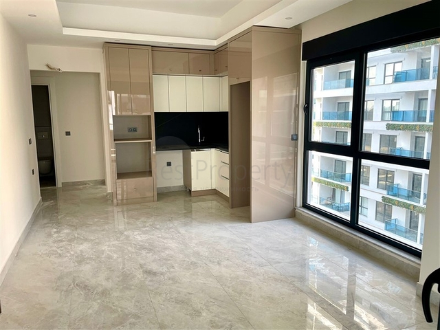 Современная квартира 1+1 в новом комплексе с бассейном и спа-зоной в Махмутларе