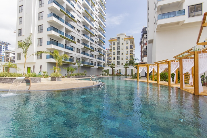 Современная квартира 1+1 в новом комплексе с бассейном и спа-зоной в Махмутларе