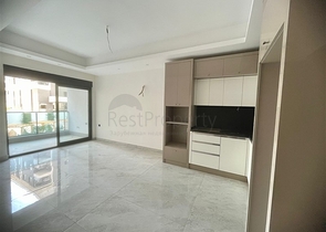 Современная квартира 1+1 в новом комплексе с бассейном и спа-зоной в Махмутларе