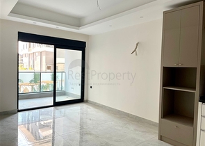 Современная квартира 1+1 в новом комплексе с бассейном и спа-зоной в Махмутларе