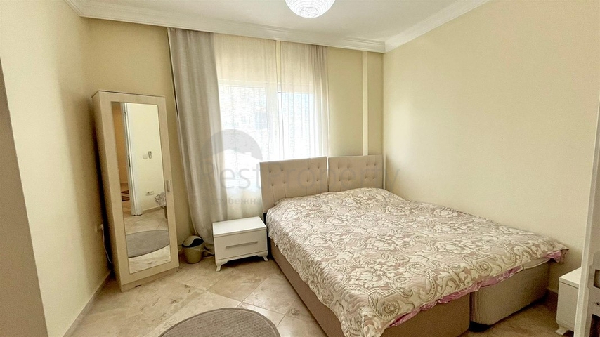 Просторная квартира 2+1 с бассейном и развитой инфраструктурой в центре Махмутлара