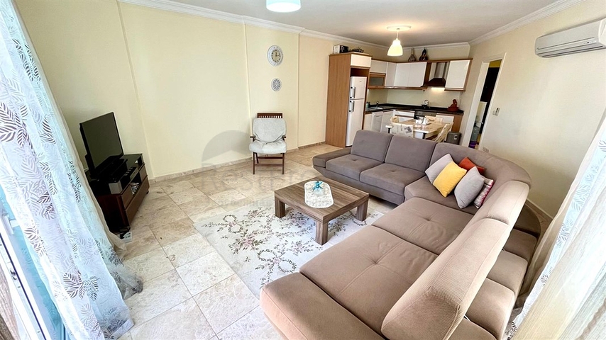 Просторная квартира 2+1 с бассейном и развитой инфраструктурой в центре Махмутлара