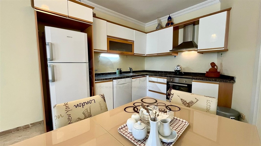 Просторная квартира 2+1 с бассейном и развитой инфраструктурой в центре Махмутлара