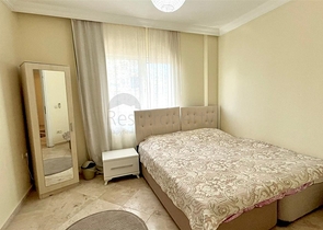 Просторная квартира 2+1 с бассейном и развитой инфраструктурой в центре Махмутлара