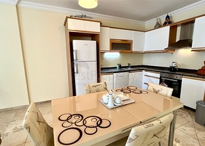 Просторная квартира 2+1 с бассейном и развитой инфраструктурой в центре Махмутлара