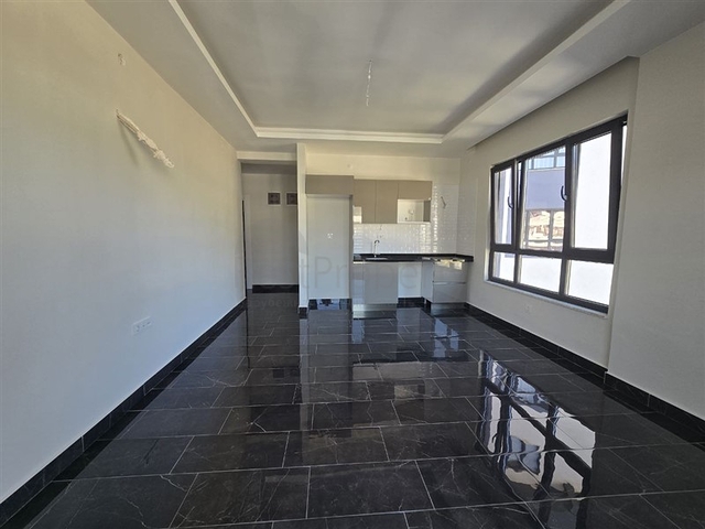 Квартира 1+1 с видом на море и богатой инфраструктурой в Махмутларе