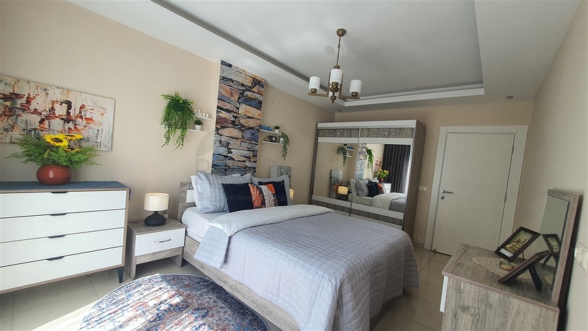 Светлая квартира 1+1 в шаговой доступности от моря в районе Оба