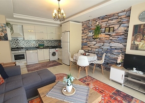 Светлая квартира 1+1 в шаговой доступности от моря в районе Оба