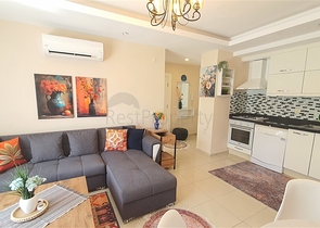 Светлая квартира 1+1 в шаговой доступности от моря в районе Оба