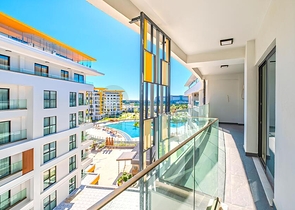 Современная квартира 2+1 в новом жилом комплексе у моря в районе Тюрклер