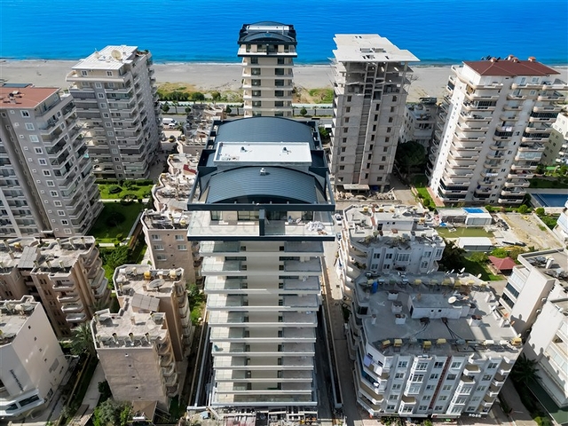 Современная квартира в шаге от моря в Махмутларе