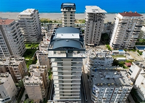 Современная квартира в шаге от моря в Махмутларе