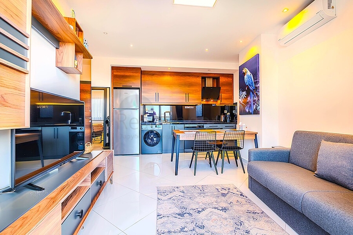 Современная квартира с полной инфраструктурой в Махмутларе