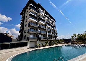 Современная квартира с полной инфраструктурой в Авсалларе