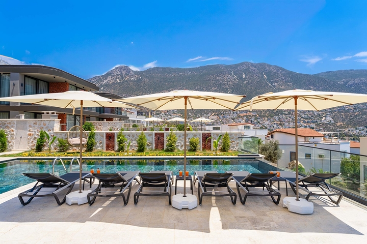 Роскошная вилла с панорамным видом на море в Фетхие Роскошная вилла с панорамным видом на море в Фетхие