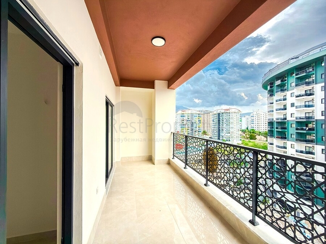 Просторная квартира с современным дизайном в Махмутларе