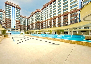 Просторная квартира с современным дизайном в Махмутларе