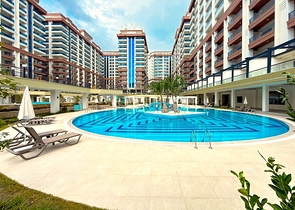 Просторная квартира с современным дизайном в Махмутларе