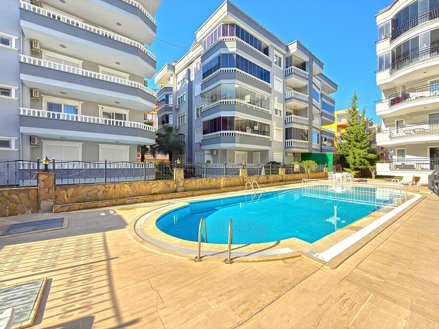 Современные апартаменты с двумя спальнями рядом с морем в районе Оба только на длительный срок