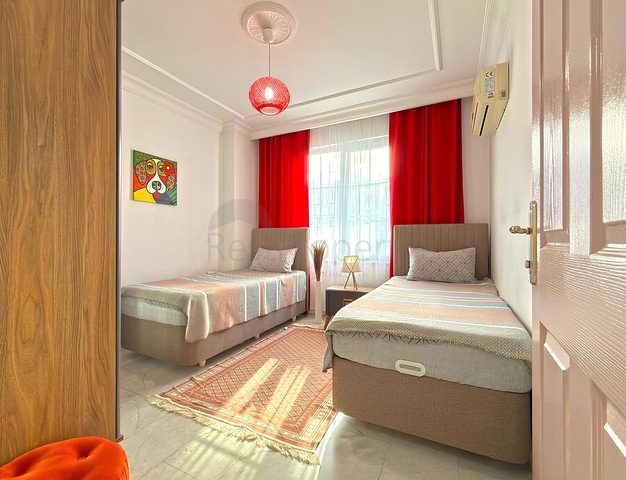 Современные апартаменты с двумя спальнями рядом с морем в районе Оба только на длительный срок