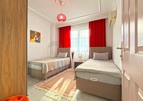 Современные апартаменты с двумя спальнями рядом с морем в районе Оба только на длительный срок