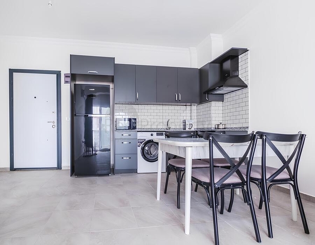 Современная квартира рядом с морем в Махмутларе