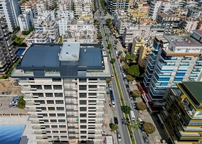 Квартира с современным дизайном рядом с морем в Махмутларе