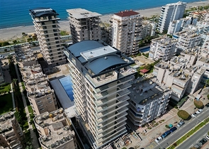 Квартира с современным дизайном рядом с морем в Махмутларе