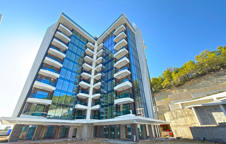 Современная квартира с панорамным видом на море в Авсалларе