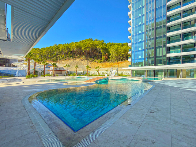 Современная квартира с панорамным видом на море в Авсалларе