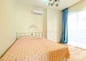 Современная квартира с просторной террасой у моря в Махмутларе